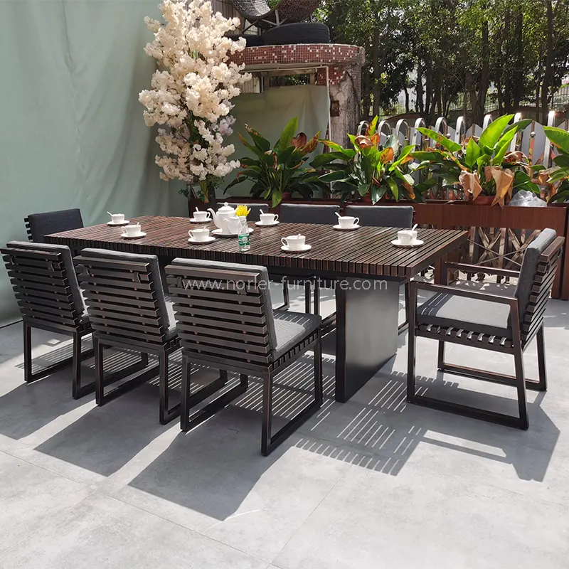 Table et chaises en aluminium à grains de bois extérieur et chaises